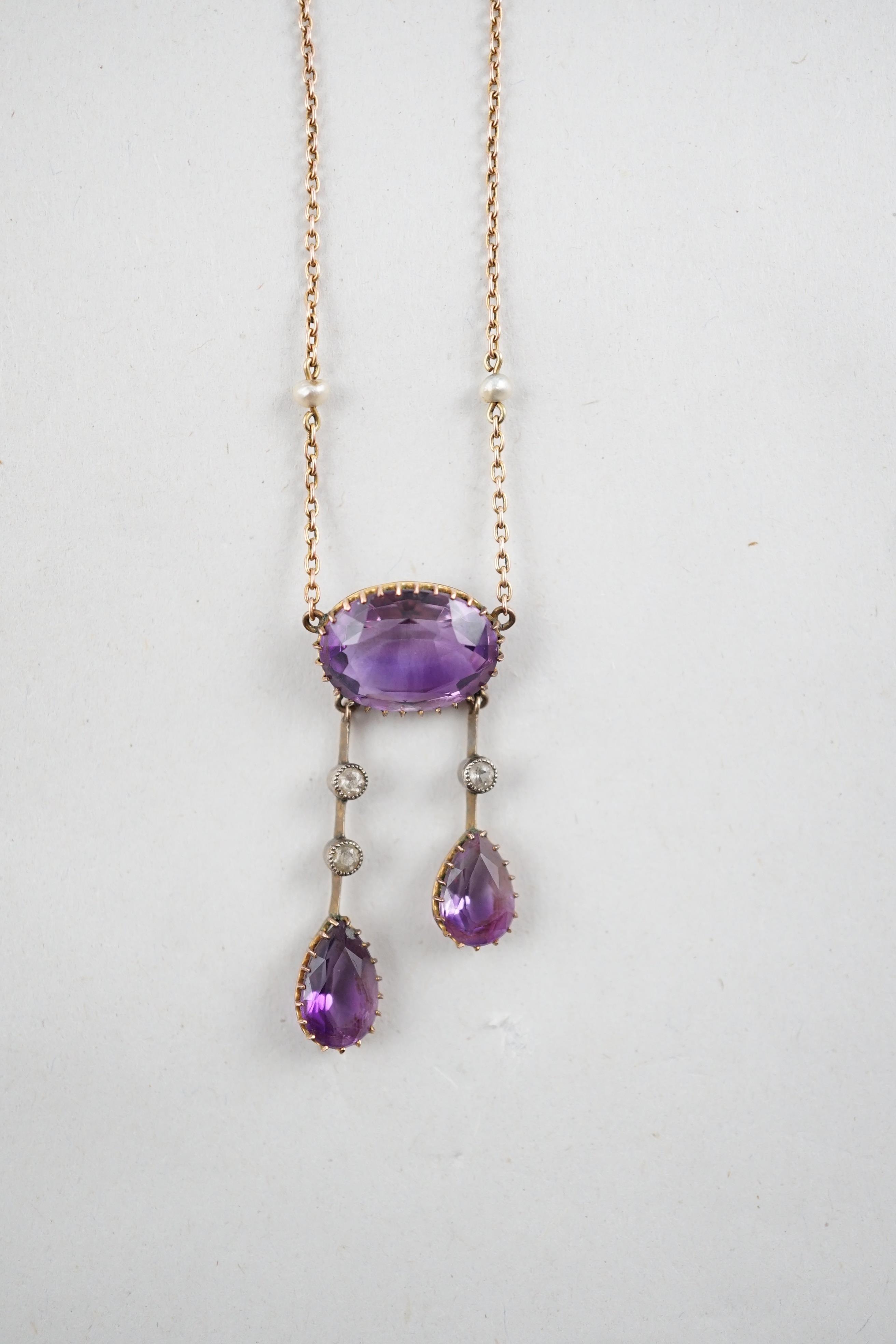 A Victorian 9ct gold, amethyst, seed pearl and gem set drop pendant necklace